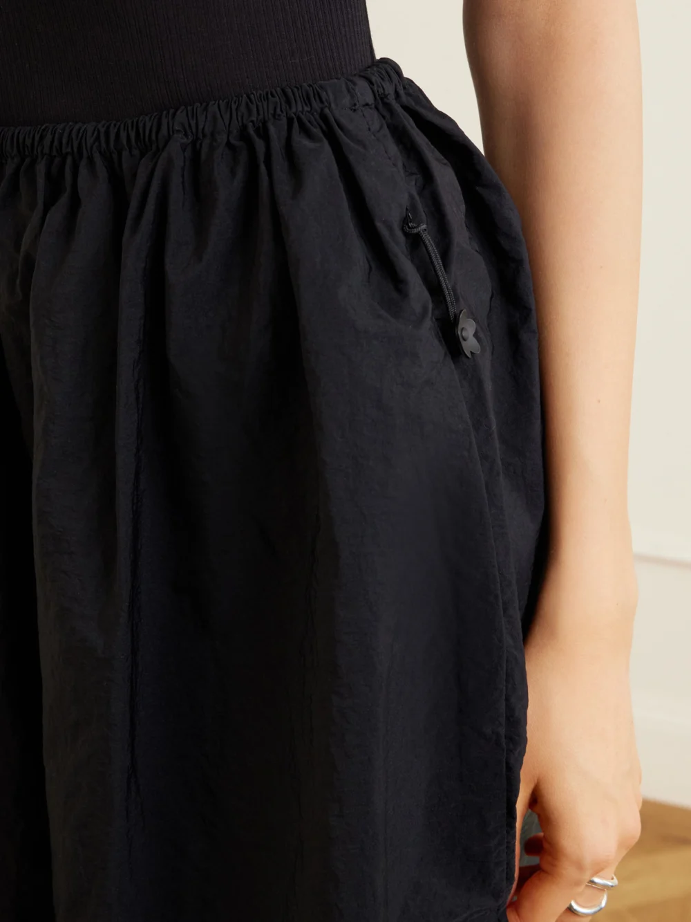 Close-up detail of the Cecilie Bahnsen Cbfiella Embroidered Scalloped Taffeta Midi Skirt