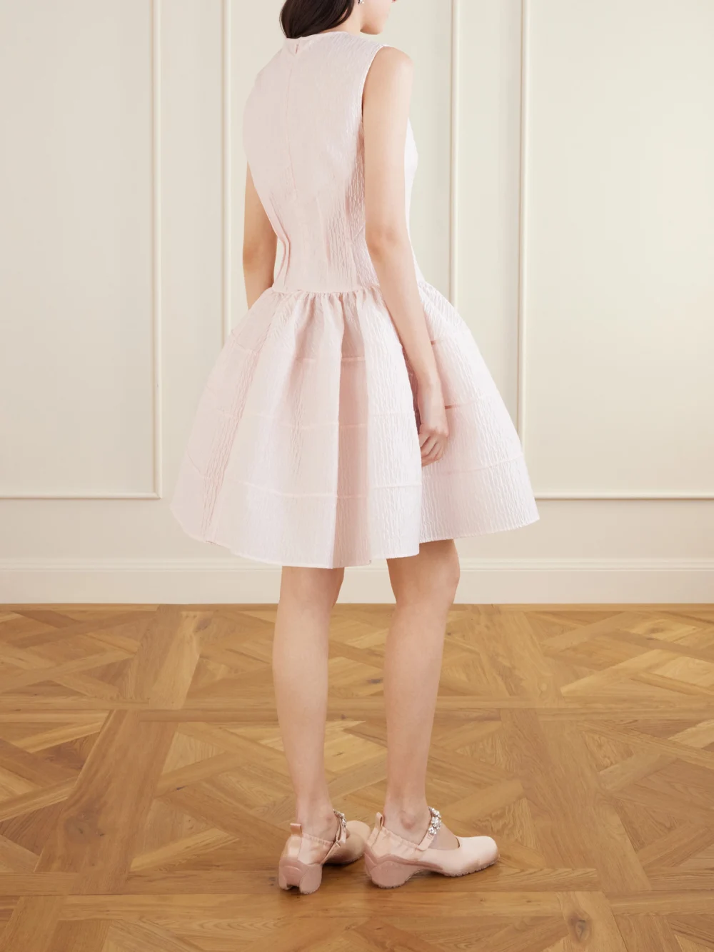 Back view of the Cecilie Bahnsen Claudie Gathered Paneled Cloqué Midi Dress