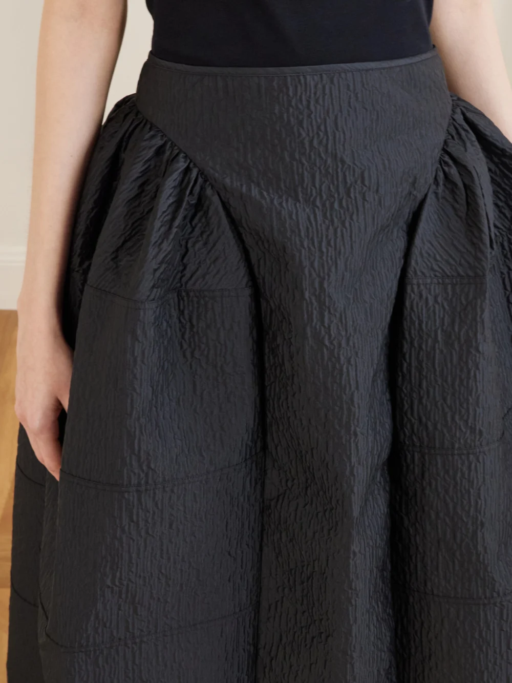 Close-up detail of the Cecilie Bahnsen Daphne Pleated Cloqué Midi Skirt