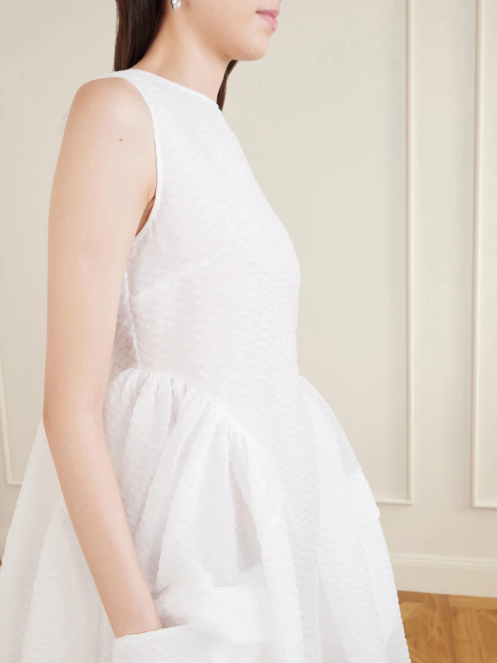 Close-up detail of the Cecilie Bahnsen Duana Lace-trimmed Cloqué Dress