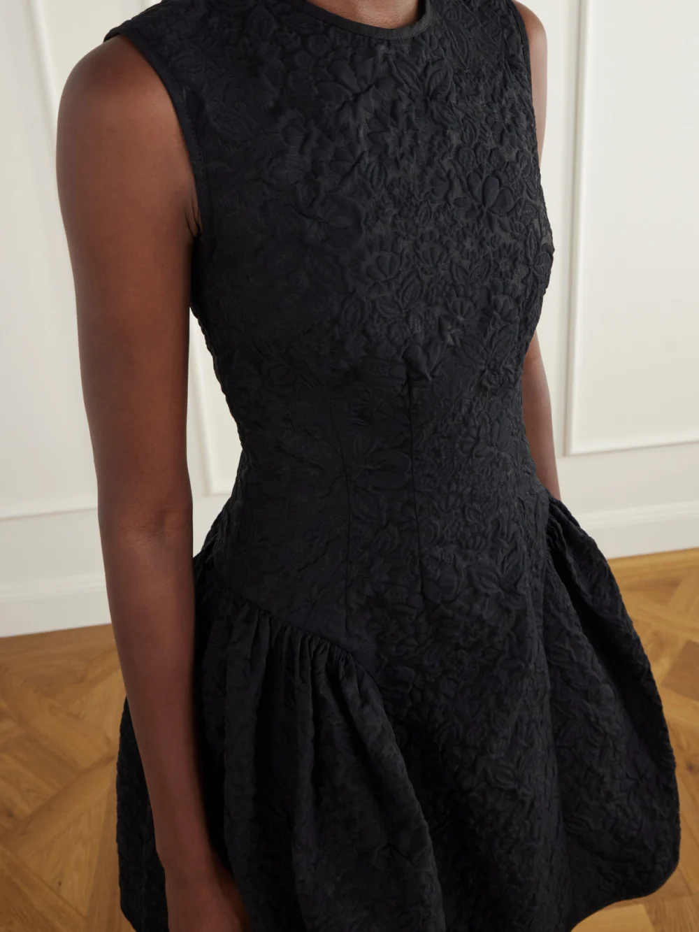 Close-up detail of the Cecilie Bahnsen Flodie Matelassé Knee-length Dress
