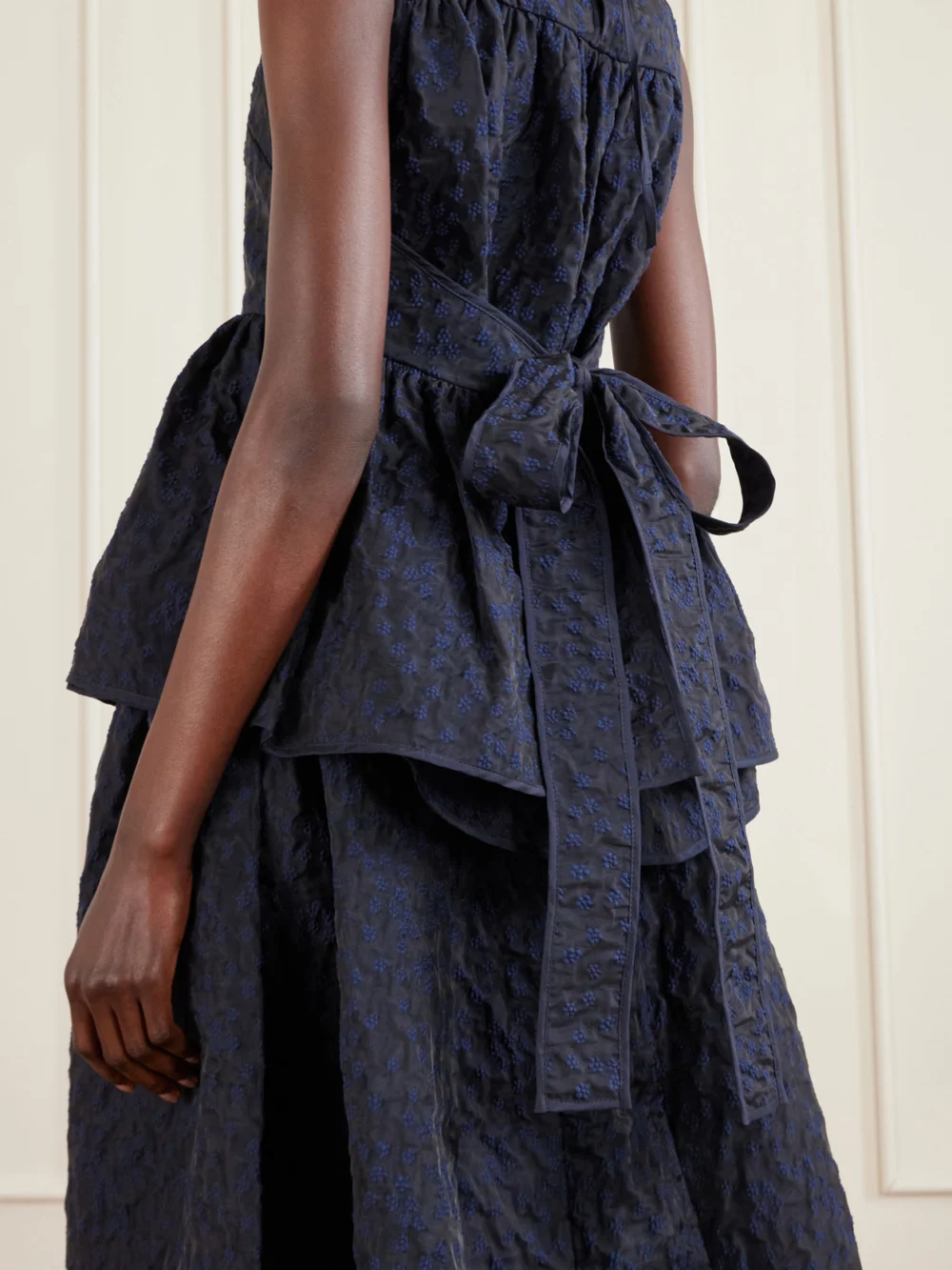 Close-up detail of the Cecilie Bahnsen Margueritte Embroidered Cotton-blend Cloqué Peplum Top