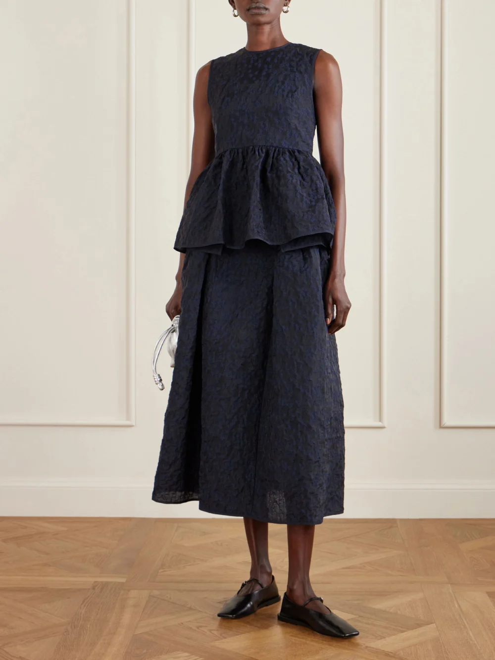 Cecilie Bahnsen Margueritte Embroidered Cotton-blend Cloqué Peplum Top, worn by a model