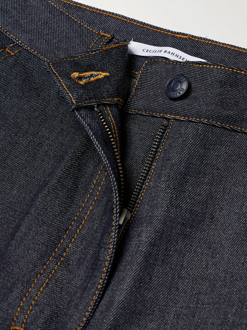 Close-up detail of the Cecilie Bahnsen Virgina Paneled High-rise Straight-leg Jeans
