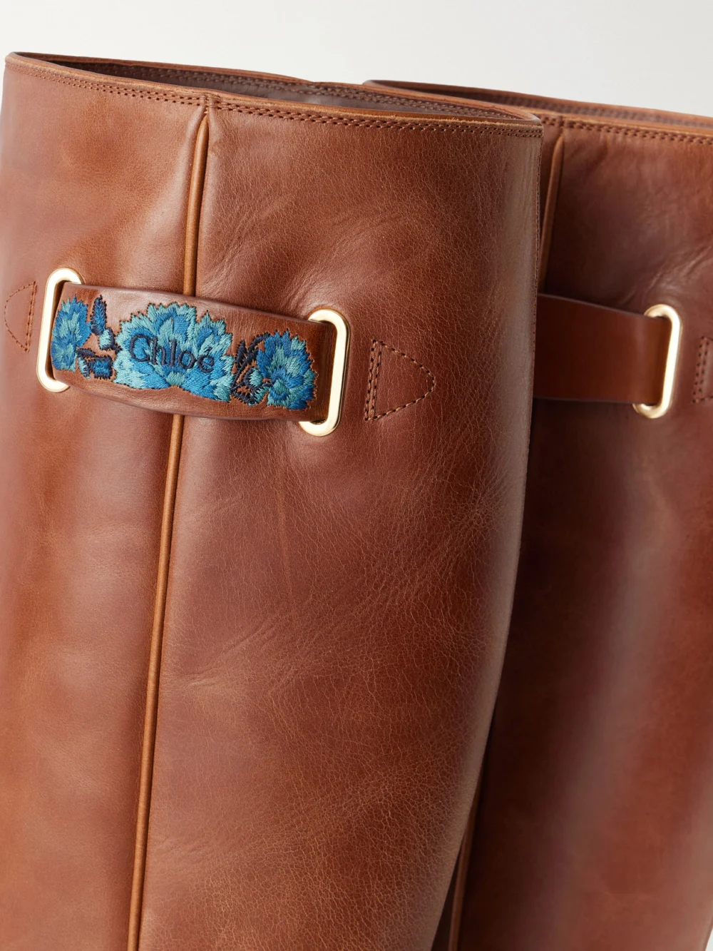 Close-up detail of the Chloé Azelan Embroidered Leather Knee Boots