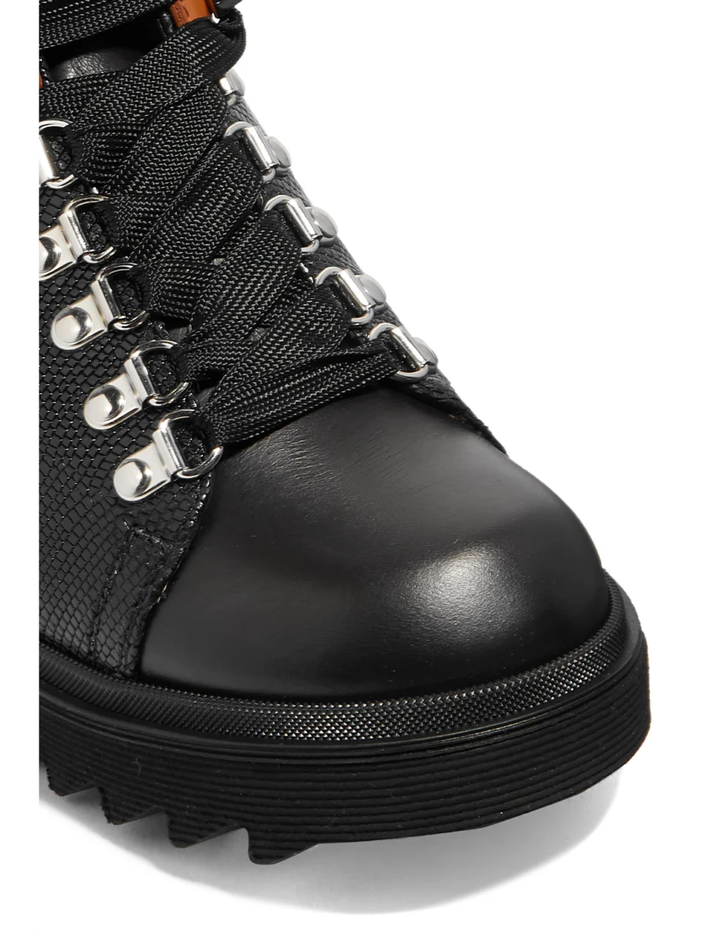 Close-up detail of the Chloé Bella Paneled Lizard-effect Leather Ankle Boots