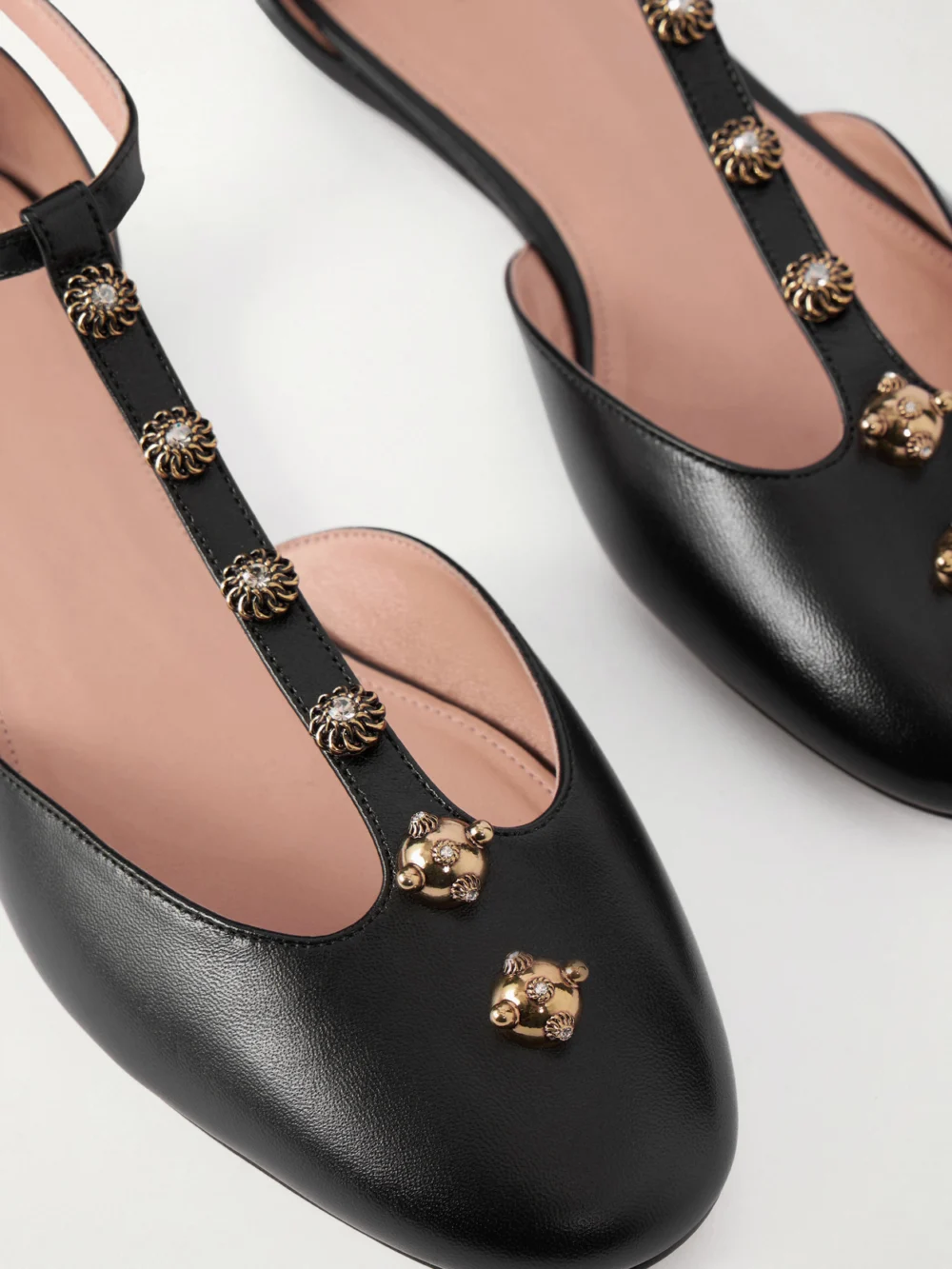 Close-up detail of the Chloé Celeste Embellished Leather Ballet Flats