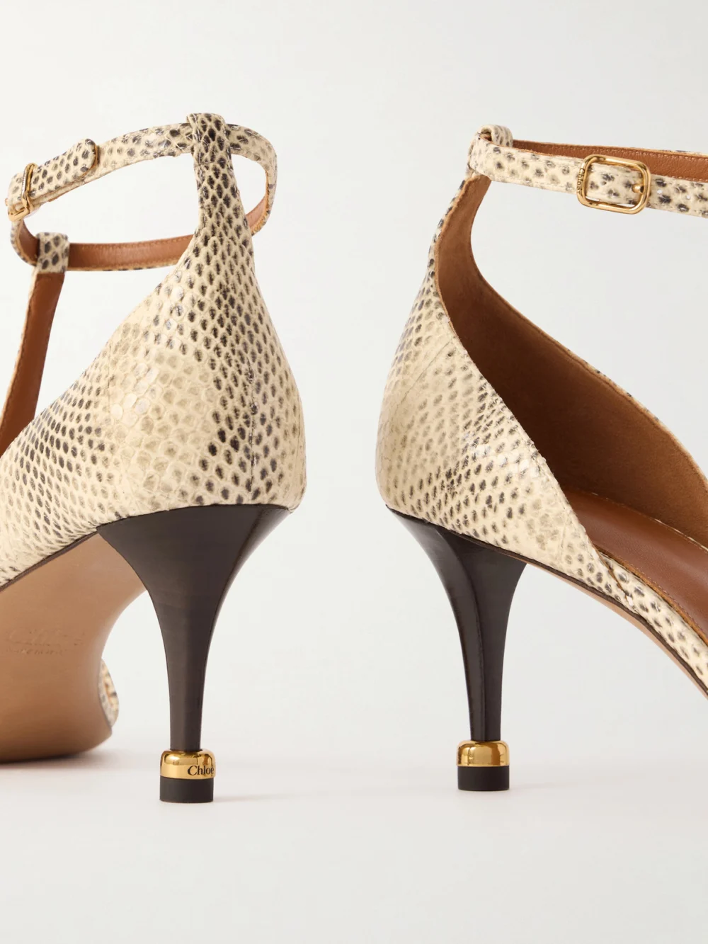 Close-up detail of the Chloé Cleia 70 Snake-effect Leather Pumps