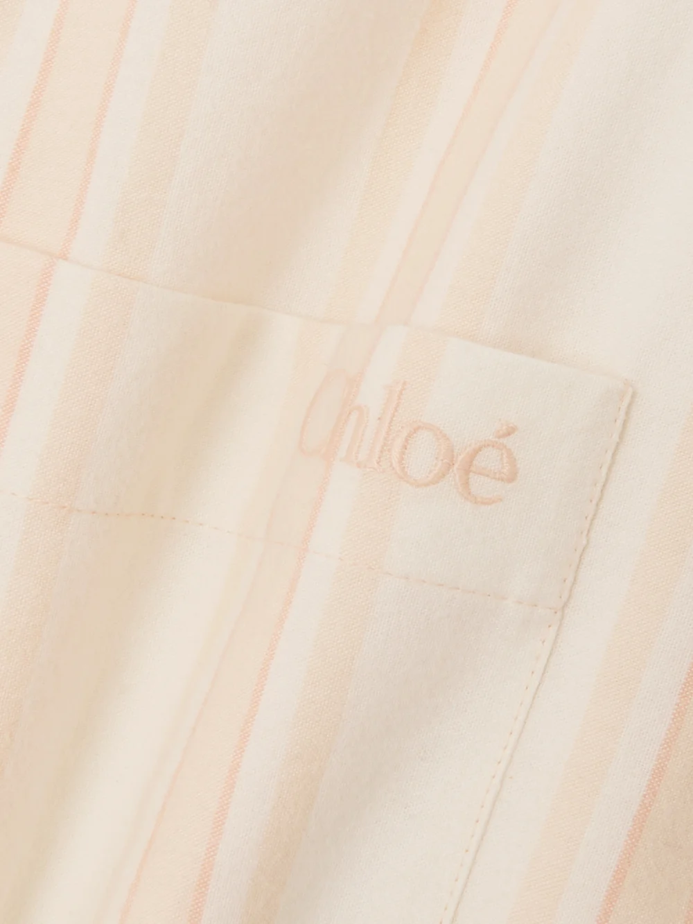 Close-up detail of the Chloé Cropped Striped Cotton-poplin Shirt