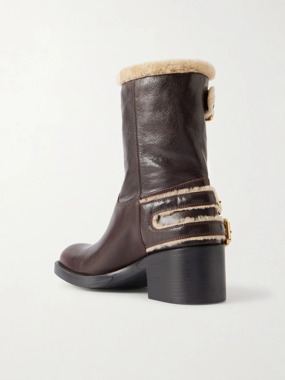 Back view of the Chloé Dakota Buckled Shearling-trimmed Leather Ankle Boots
