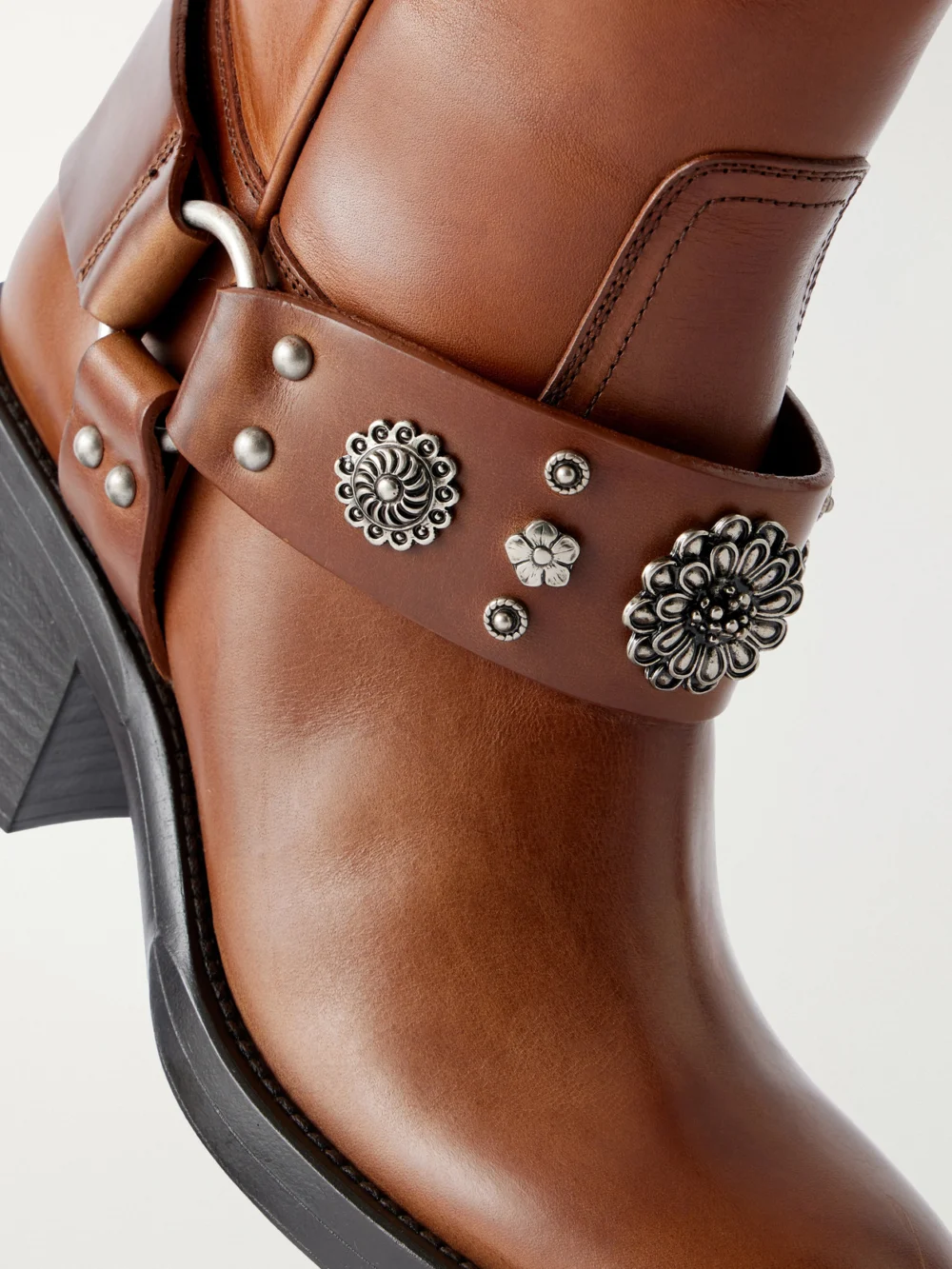 Close-up detail of the Chloé Dakota Stud-embellished Leather Knee Boots