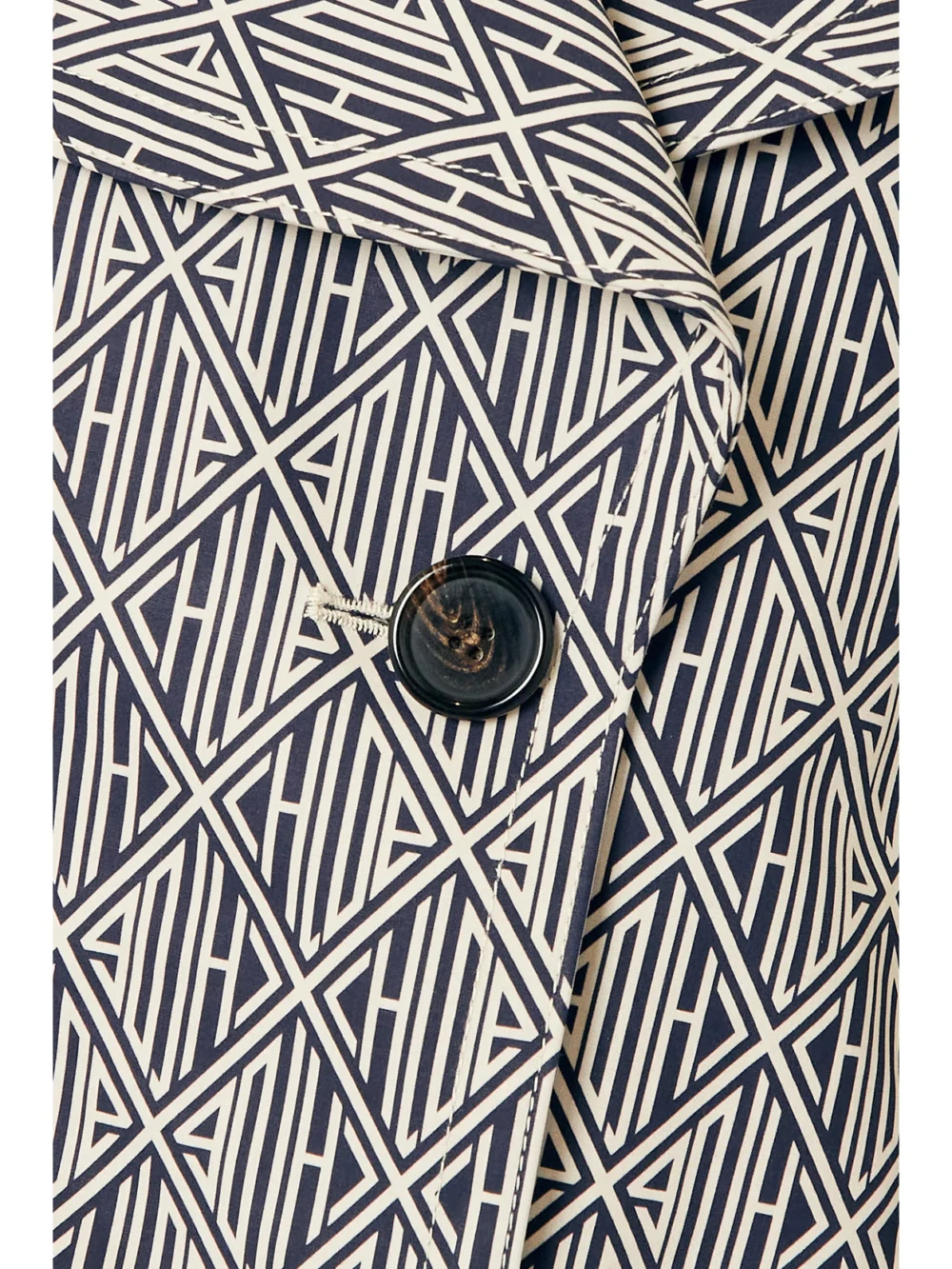 Close-up detail of the Chloé Double-breasted Printed Cotton-gabardine Coat