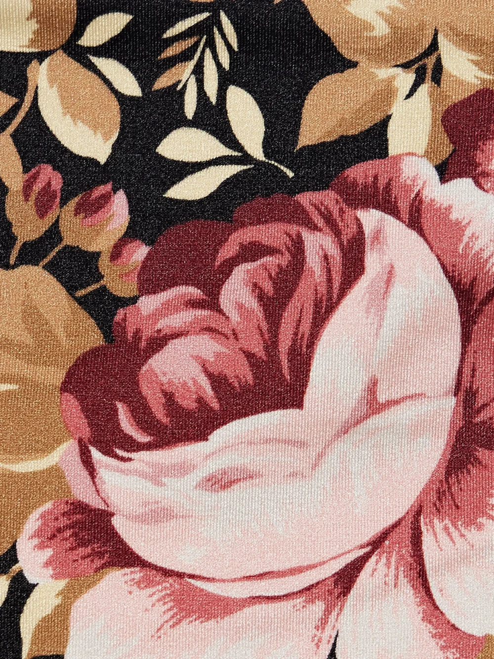 Close-up detail of the Chloé Embellished Floral-print Bikini Briefs