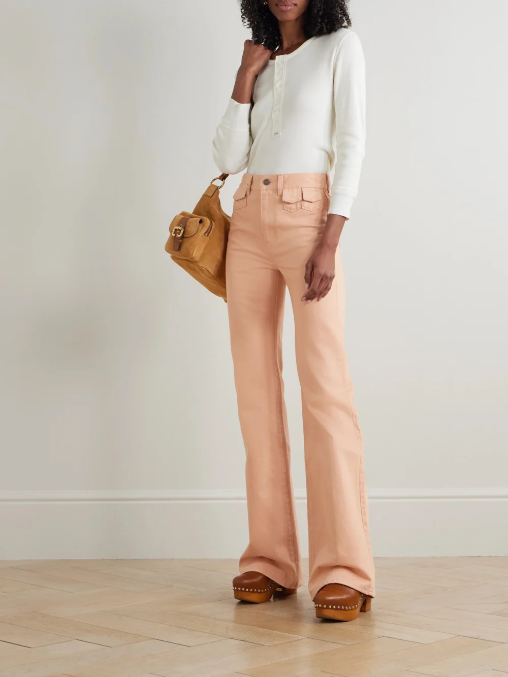 Chloé Embellished High-rise Straight-leg Jeans, worn by a model