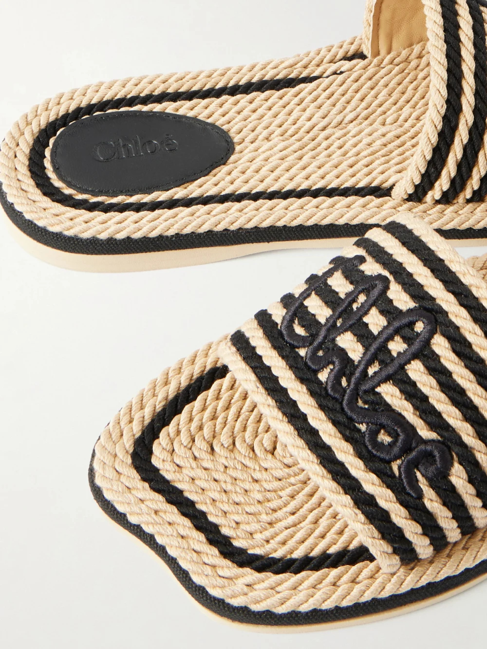 Close-up detail of the Chloé Embroidered Striped Cord Slides
