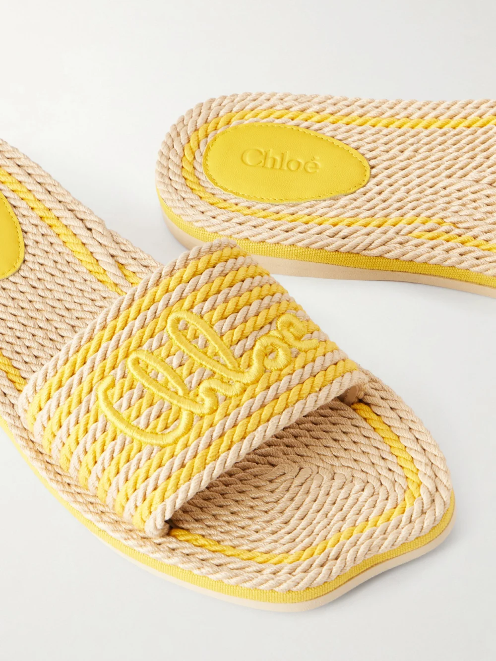 Close-up detail of the Chloé Embroidered Striped Cord Slides