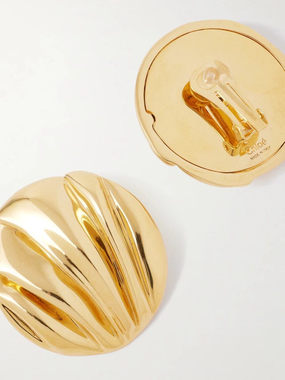 Close-up detail of the Chloé Gold-tone Clip Earrings
