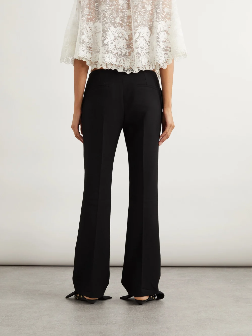 Back view of the Chloé Grain De Poudre Wool Flared Pants