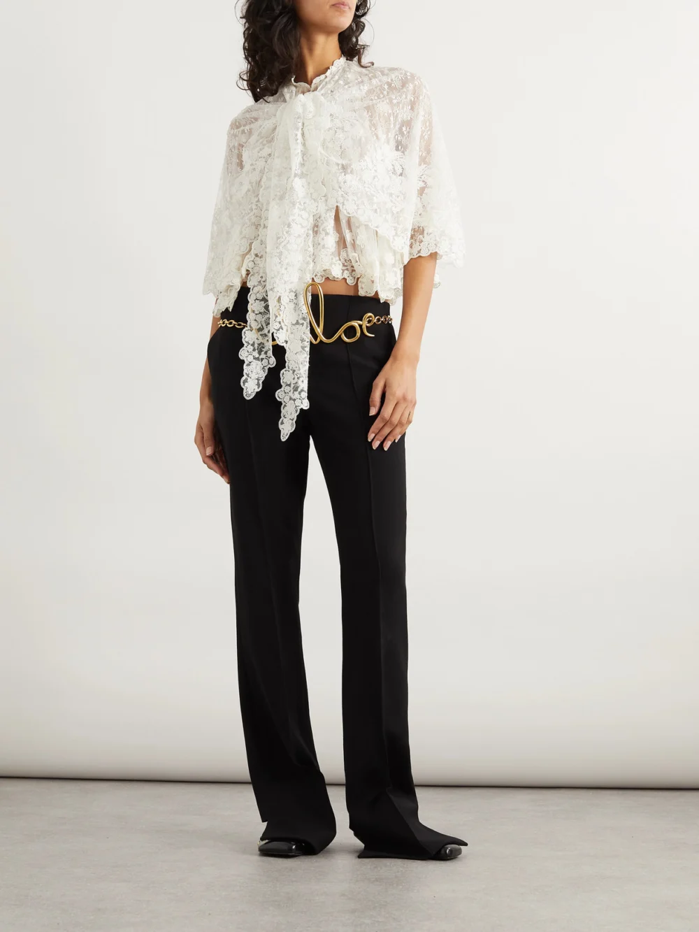 Chloé Grain De Poudre Wool Flared Pants, worn by a model