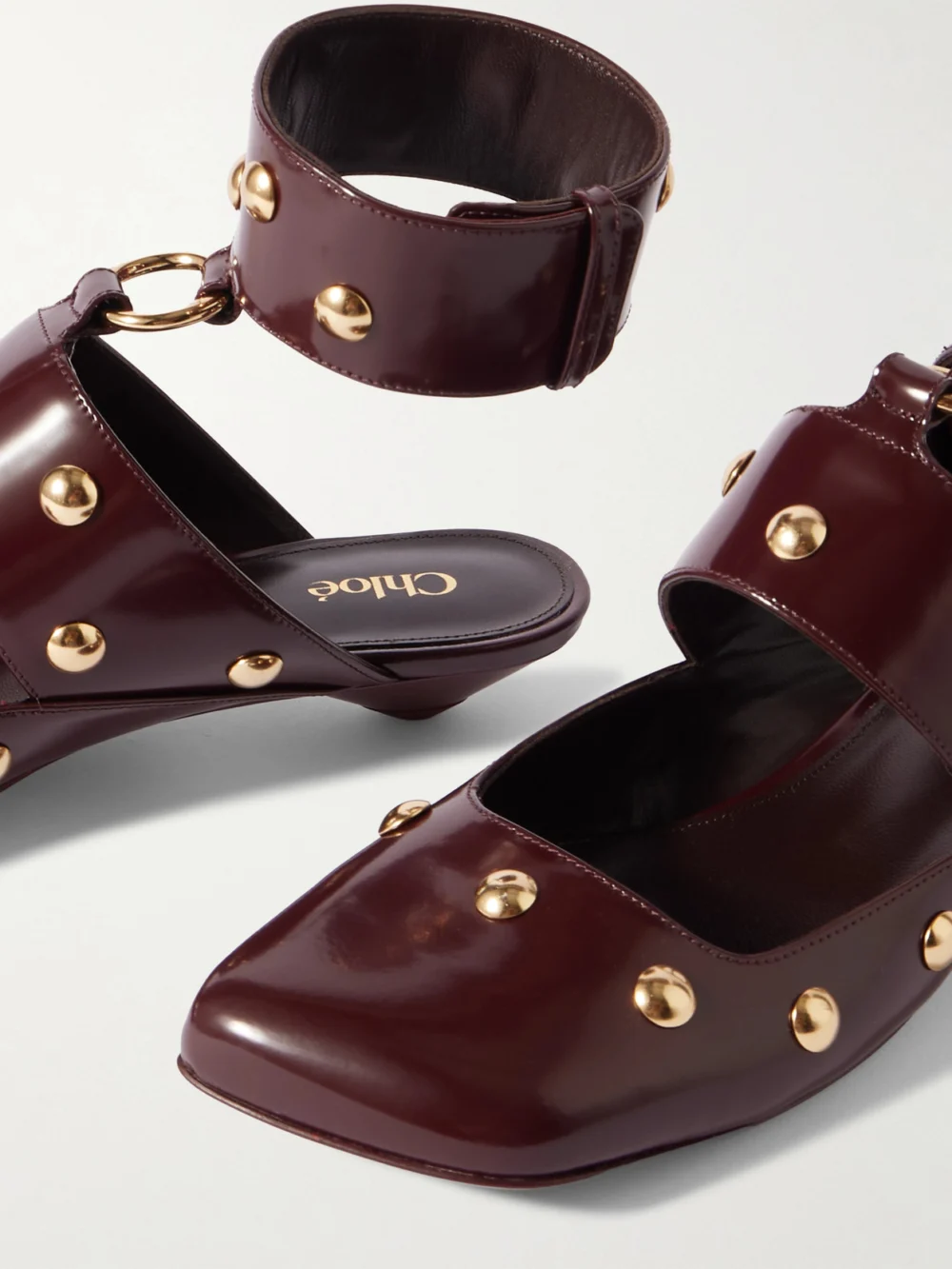 Close-up detail of the Chloé Jade Studded Leather Pumps