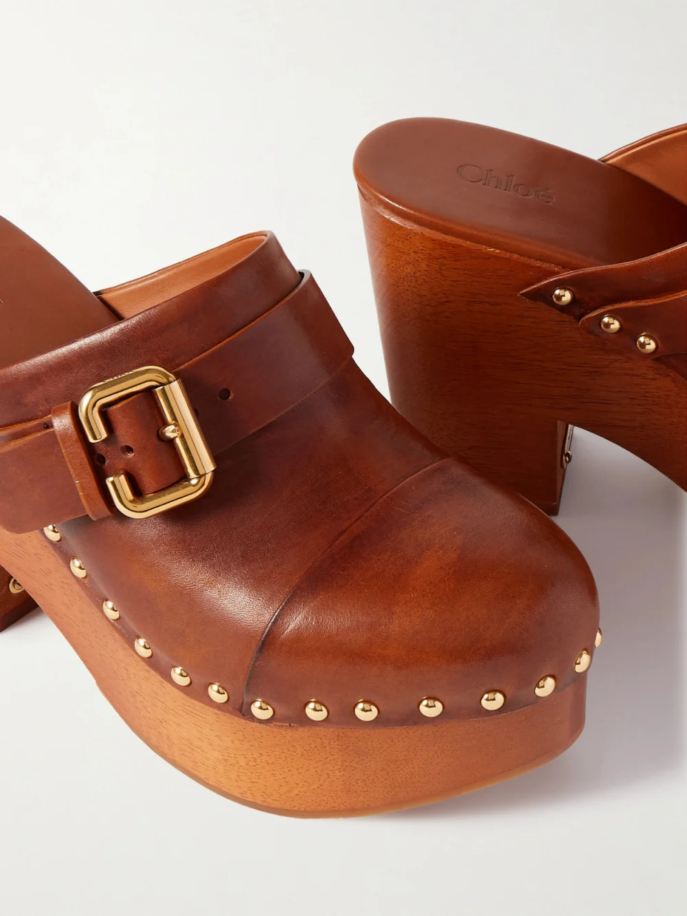 Close-up detail of the Chloé Jeanette Studded Platform Clogs