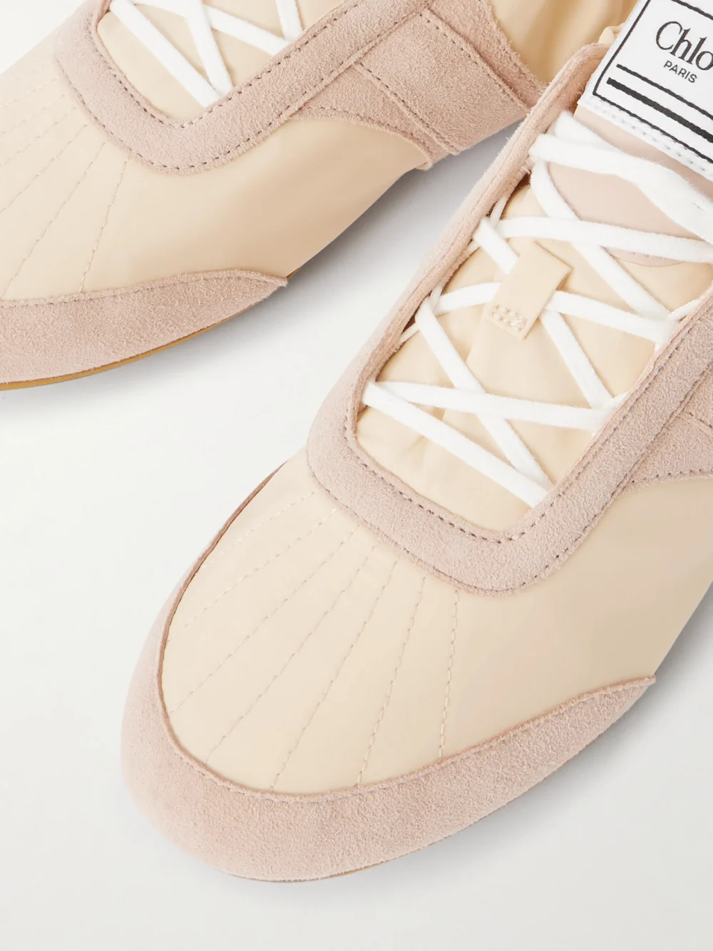 Close-up detail of the Chloé Kick Suede-trimmed Shell Sneakers