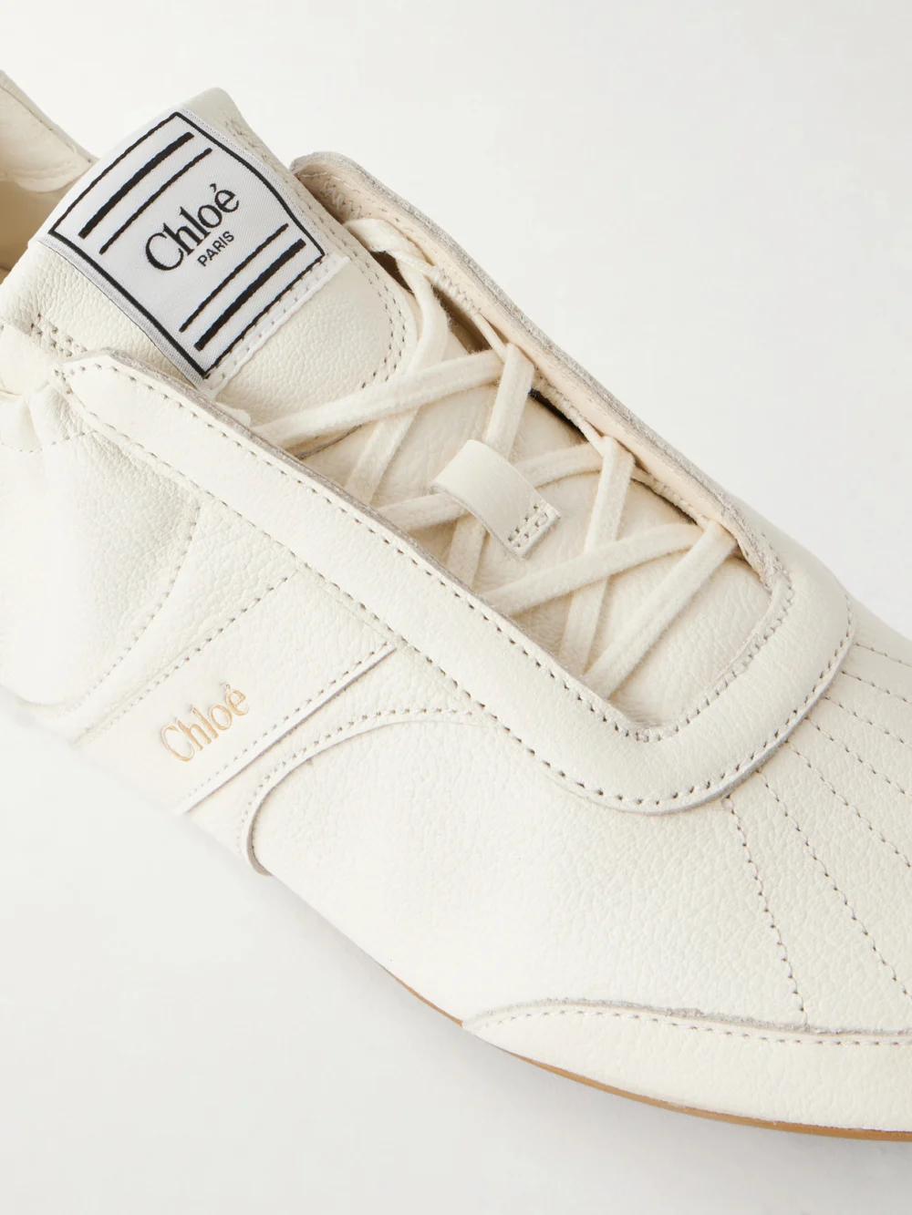 Close-up detail of the Chloé Kick Textured-leather Low-top Sneakers