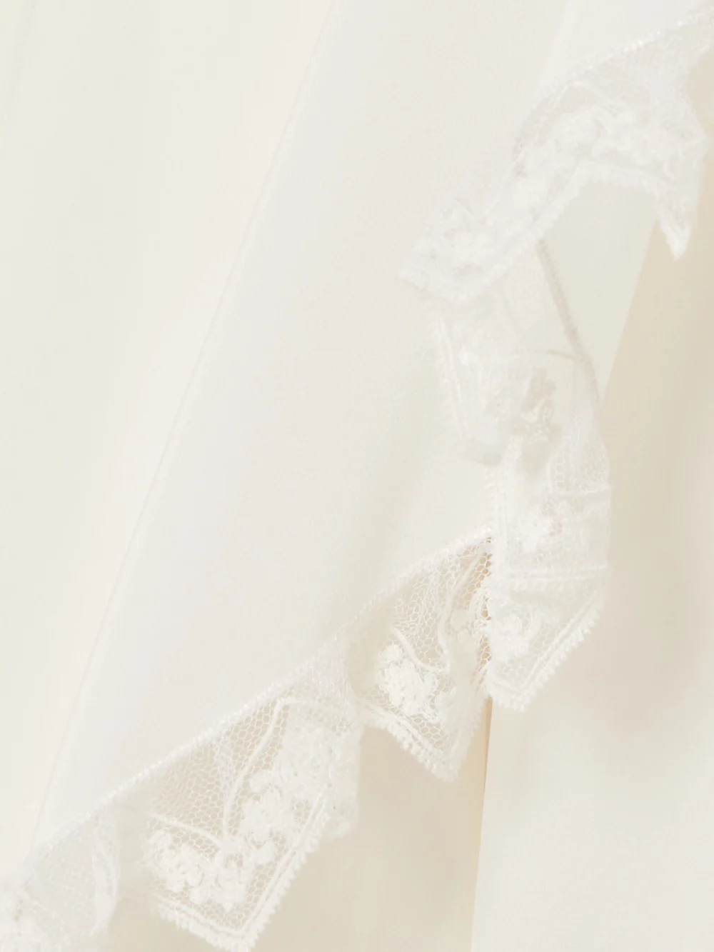Close-up detail of the Chloé Lace-trimmed Draped Layered Silk-crepe De Chine Shirt