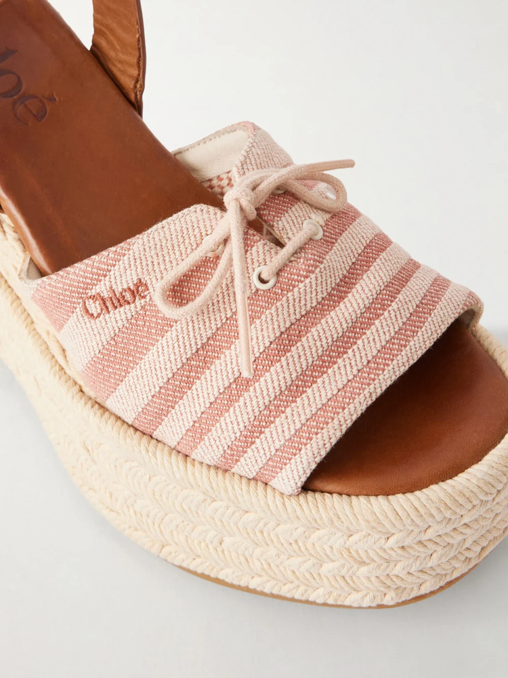 Close-up detail of the Chloé Leather-trimmed Striped Canvas Platform Sandals