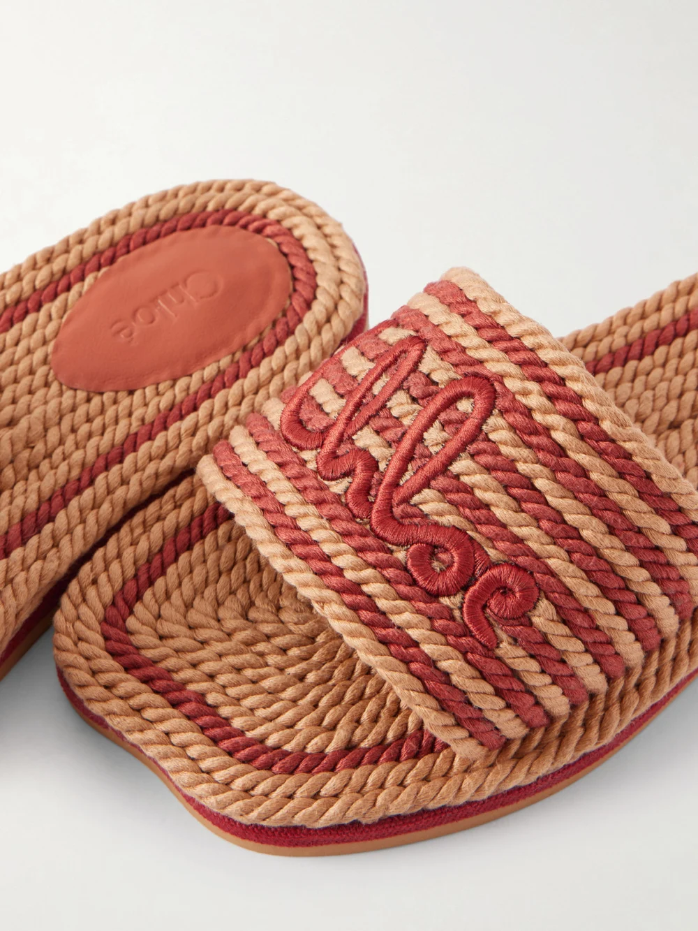 Close-up detail of the Chloé Logo-embroidered Striped Cord Slides