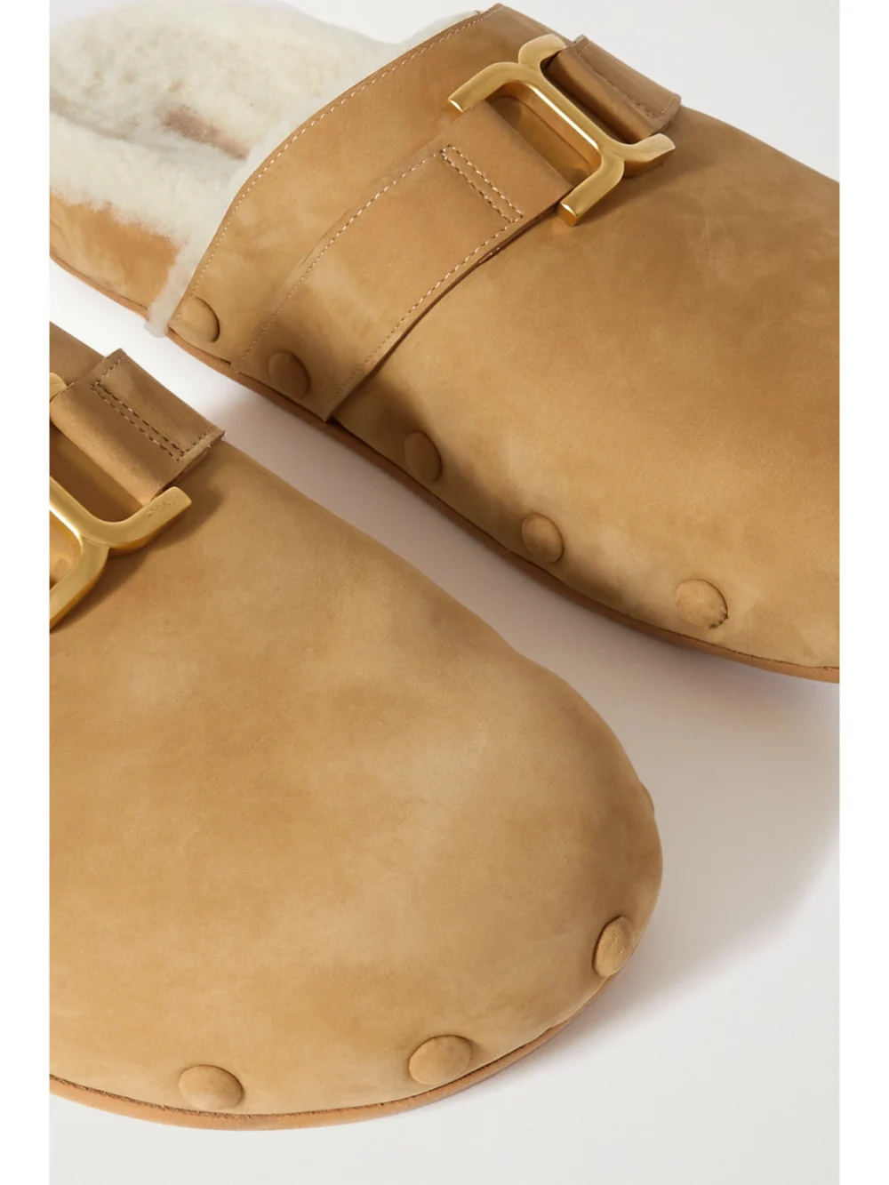 Close-up detail of the Chloé Marcie Embellished Shearling-lined Nubuck Slippers