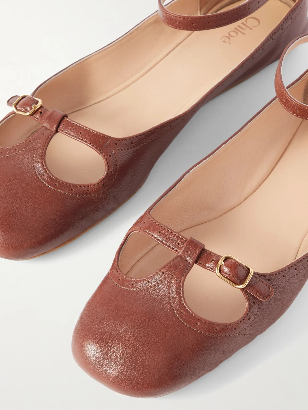 Close-up detail of the Chloé Misty Laser-cut Leather Ballet Flats