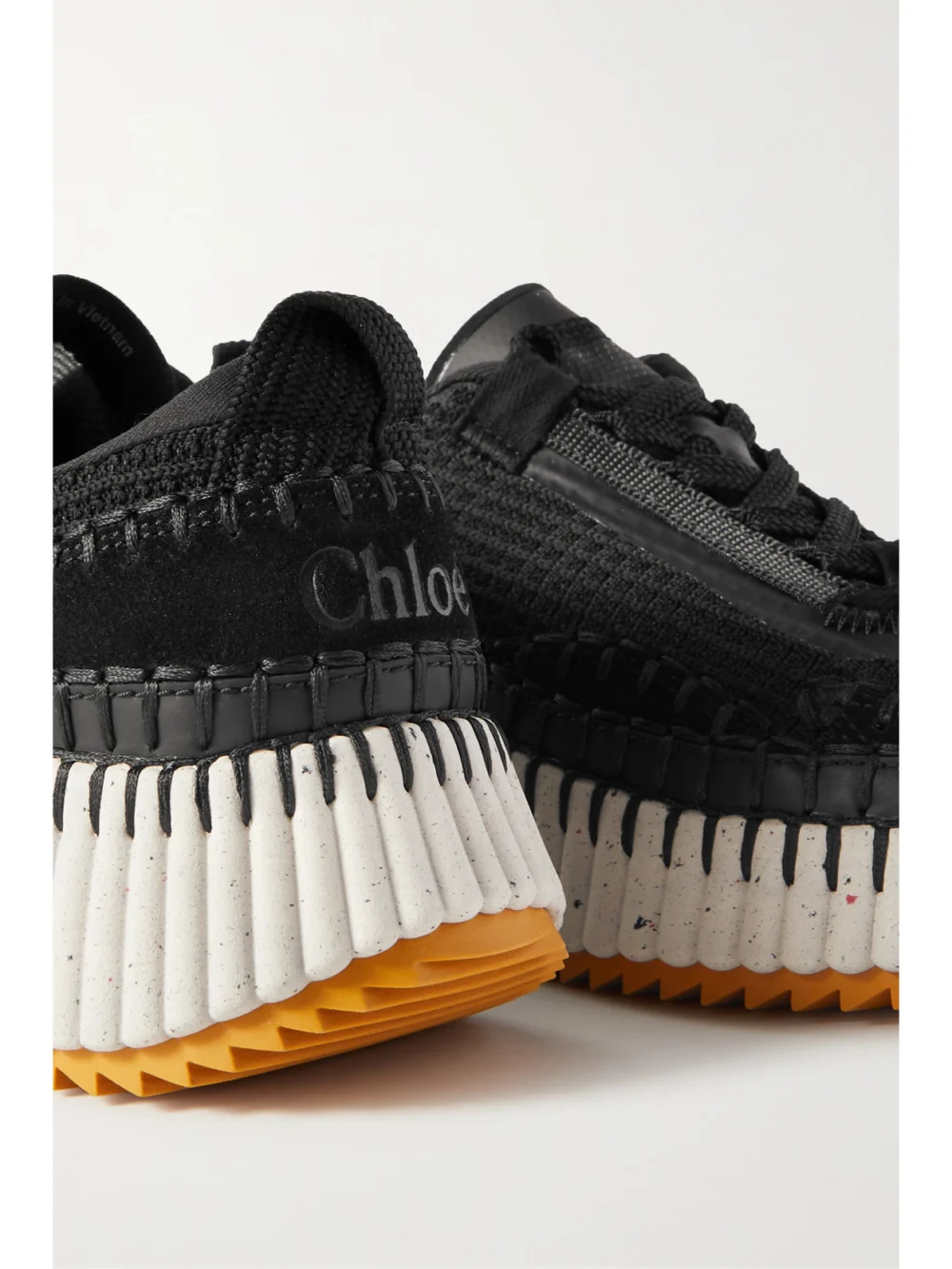 Close-up detail of the Chloé Nama Embroidered Suede and Recycled-mesh Sneakers