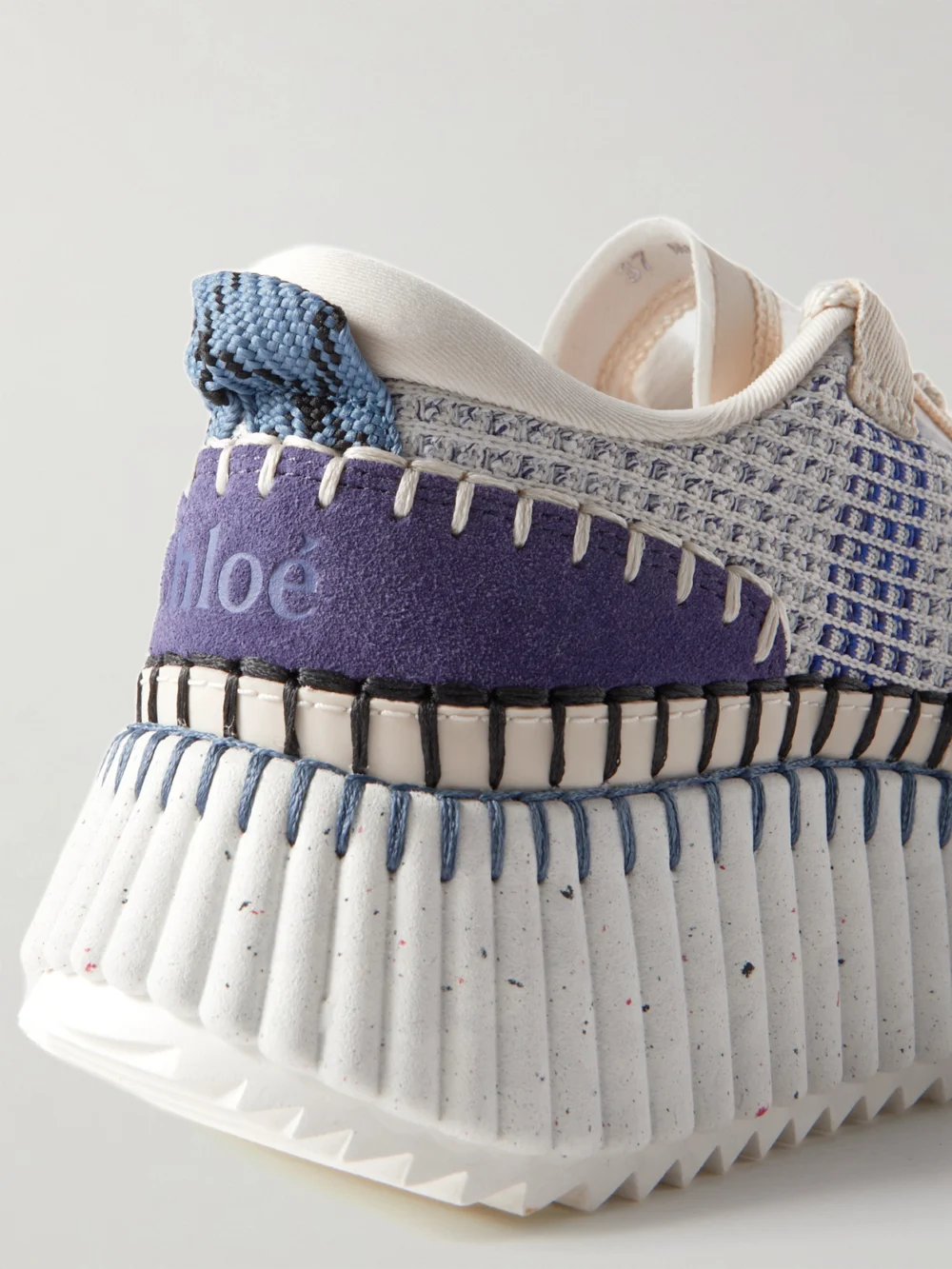 Close-up detail of the Chloé Nama Embroidered Suede and Recycled-mesh Sneakers