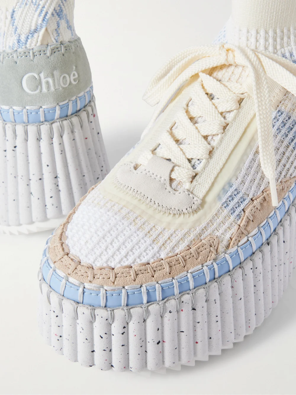 Close-up detail of the Chloé Nama Leather-trimmed Embroidered Suede and Mesh Platform Sneakers