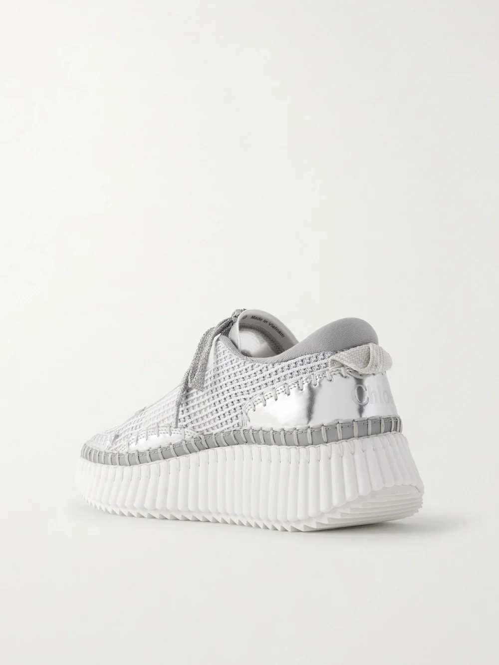 Back view of the Chloé Nama Metallic Leather-trimmed Mesh Sneakers