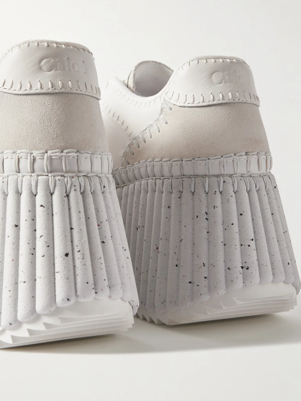 Close-up detail of the Chloé Nama Suede-trimmed Leather Platform Sneakers