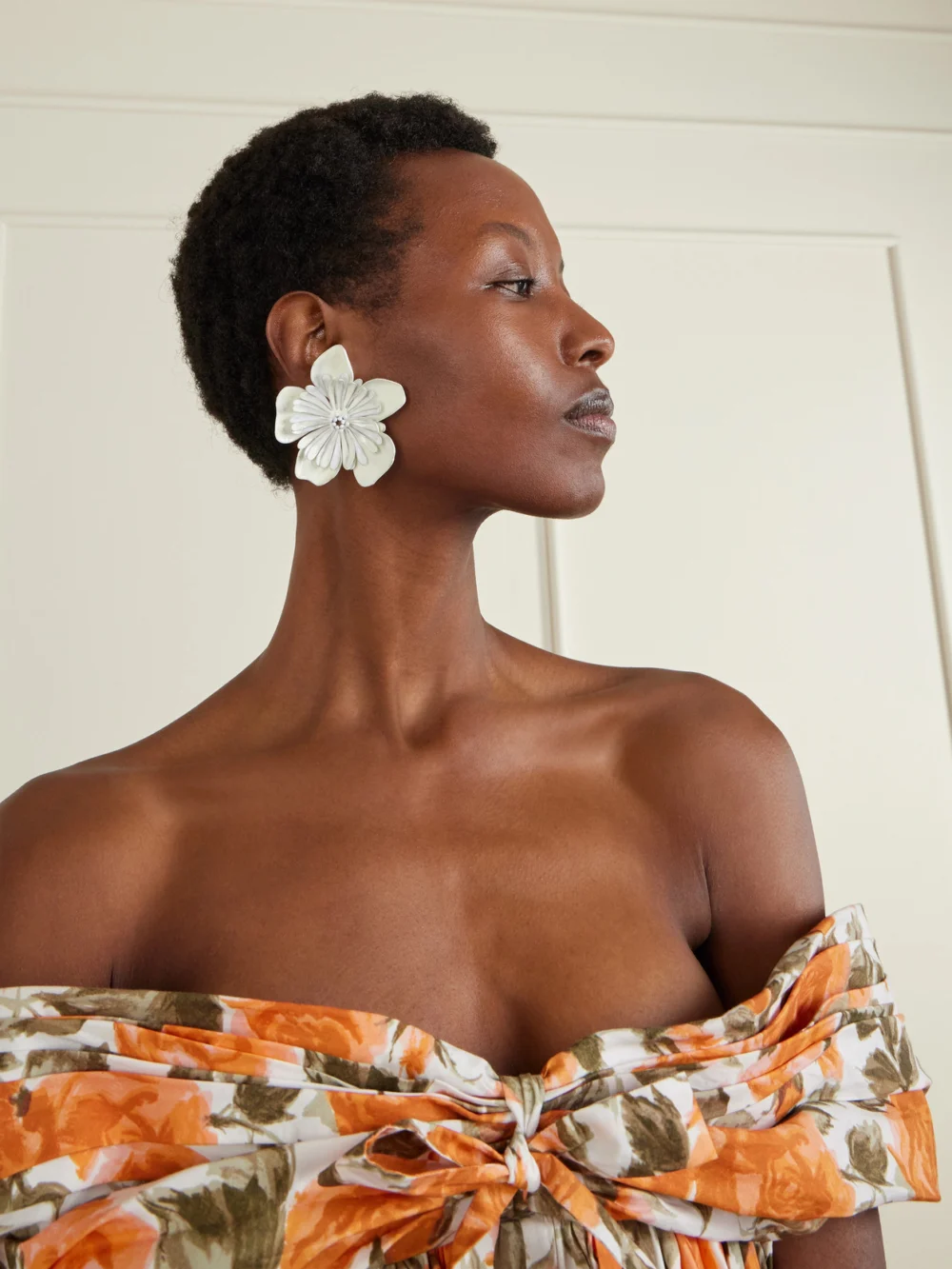 Chloé Oversized Resin Clip Earrings, styled view