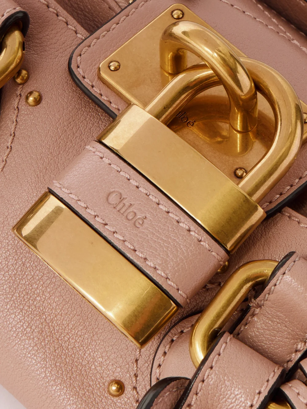 Close-up detail of the Chloé Paddington Embellished Leather Top-handle Bag