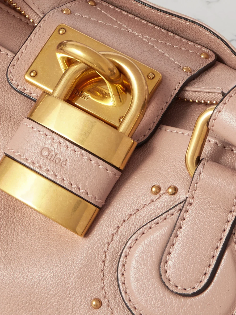 Close-up detail of the Chloé Paddington Embellished Leather Tote