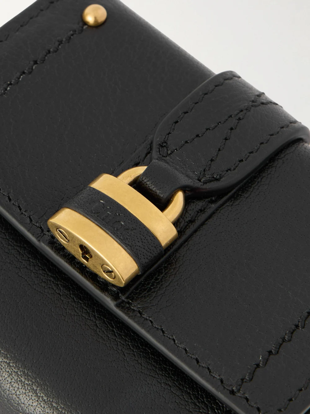 Close-up detail of the Chloé Paddington Embellished Textured-leather Cardholder
