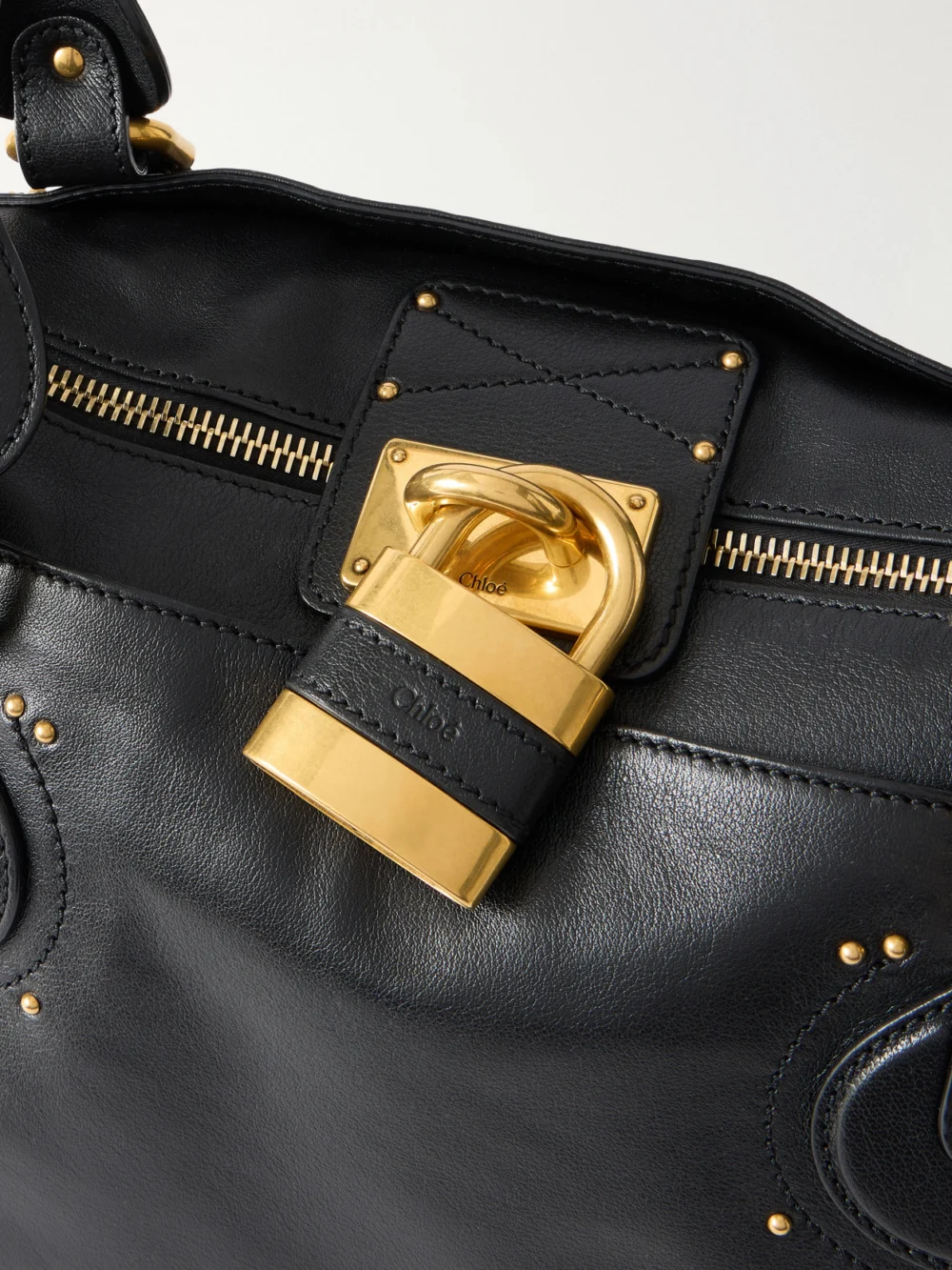 Close-up detail of the Chloé Paddington Large Locket-detail Leather Bag