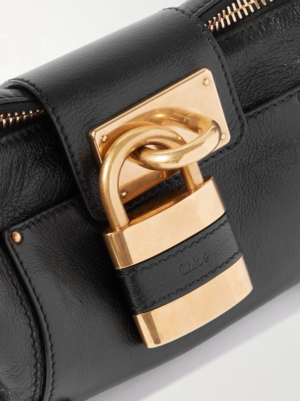 Close-up detail of the Chloé Paddington Textured-leather Shoulder Bag
