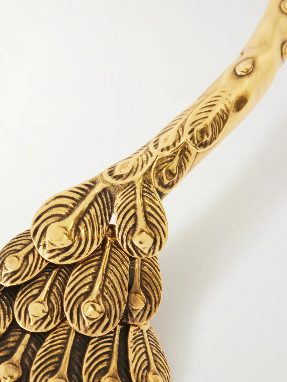 Close-up detail of the Chloé Peacock Gold-tone Choker