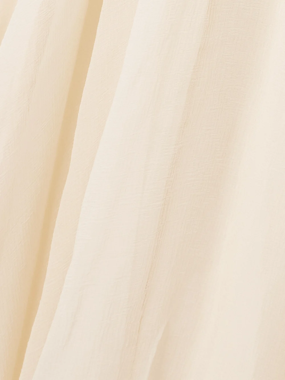 Close-up detail of the Chloé Pleated Organic Silk-mousseline Midi Shirt Dress
