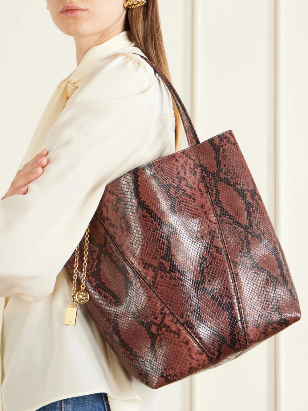 Chloé Spin Embellished Snake-effect Leather Tote, styled view