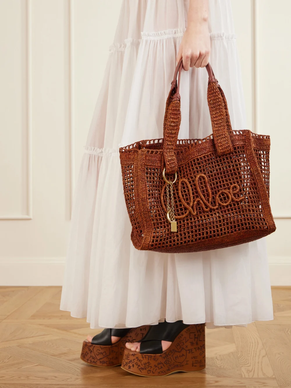 Chloé Summer Banana Leather-trimmed Raffia Tote, styled view
