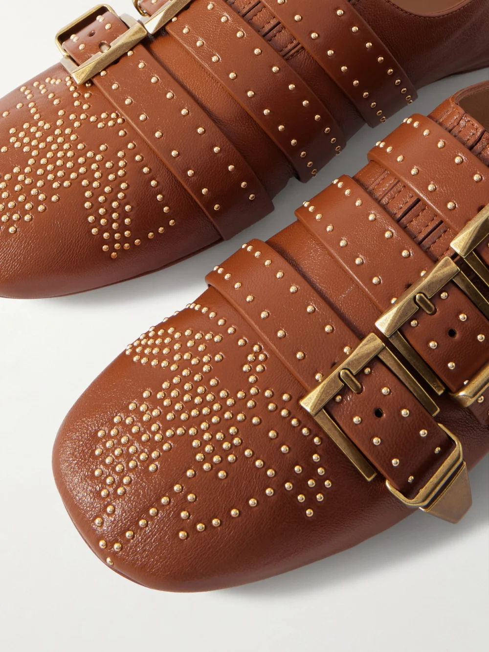 Close-up detail of the Chloé Susan Studded Buckled Leather Flats