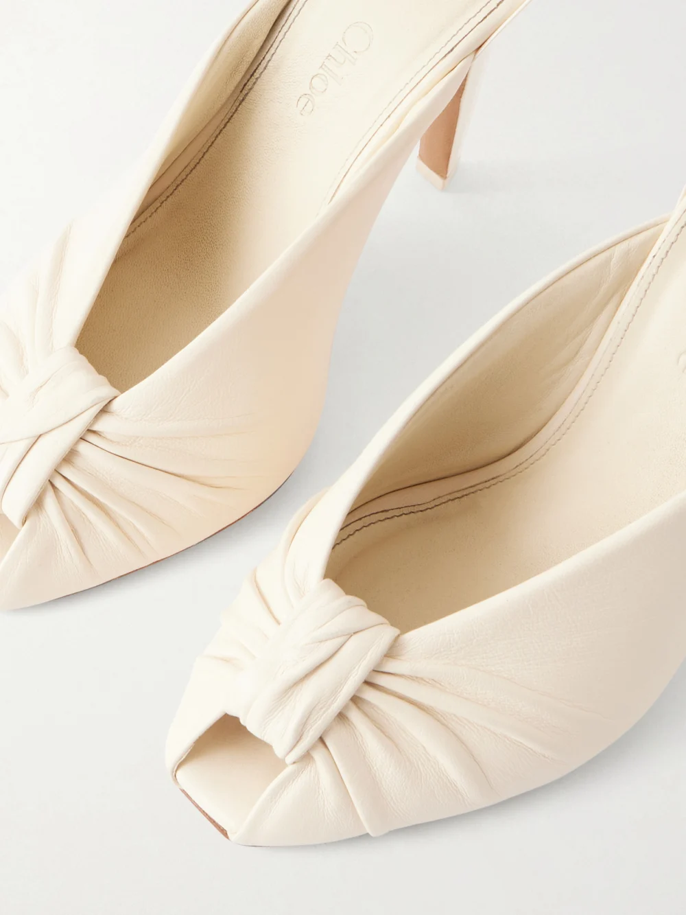 Close-up detail of the Chloé Suzie Leather Pumps