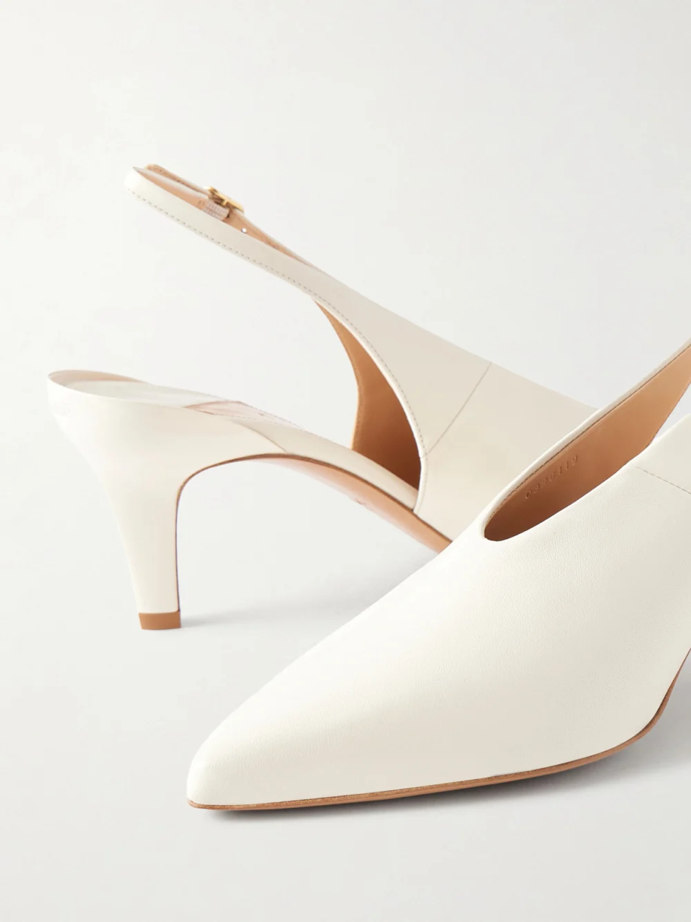 Close-up detail of the Chloé Suzie Leather Slingback Pumps